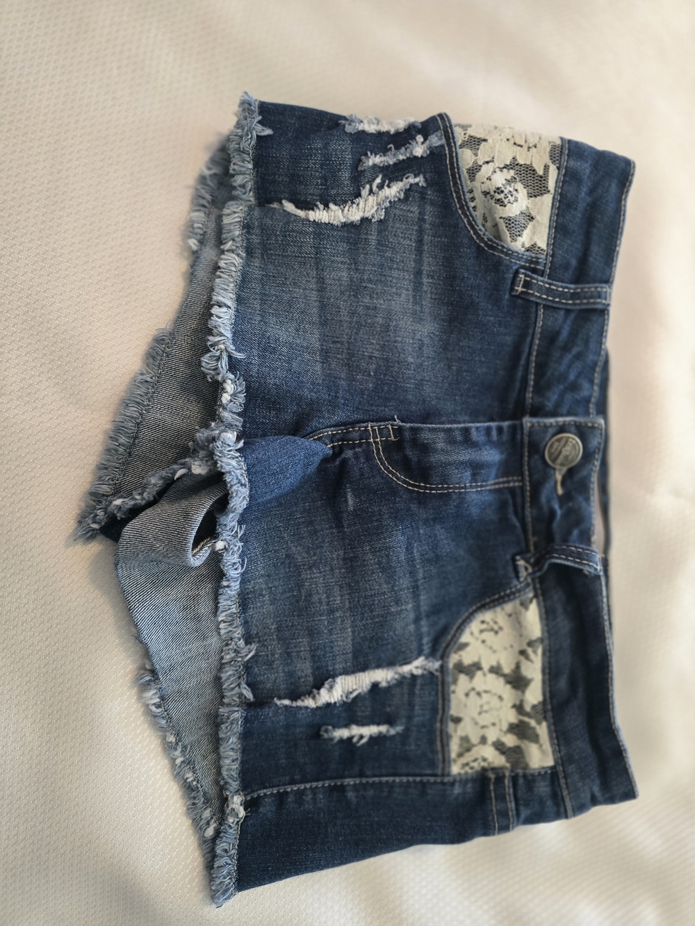 iris Blue Distressed Denim Shorts with Lace Pocket Accents